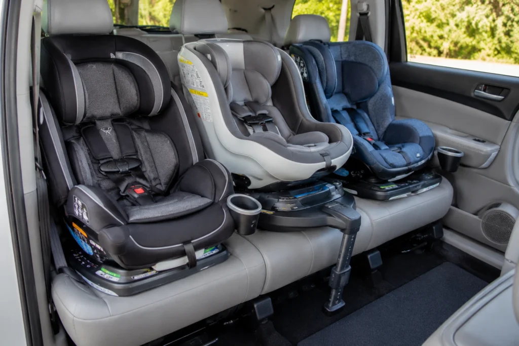 rotating car seat for three across 2