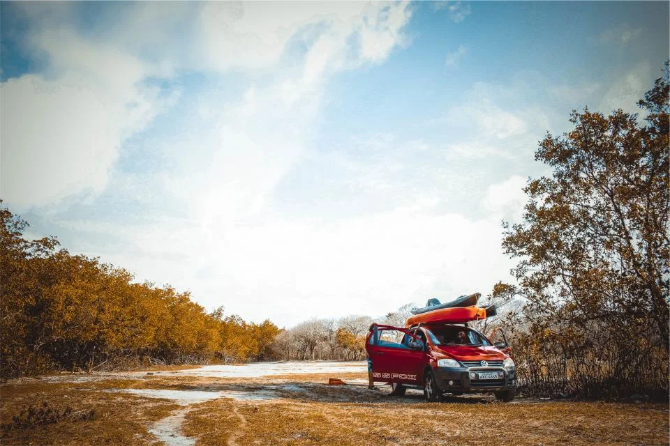 Family SUV parked outdoors on a road trip